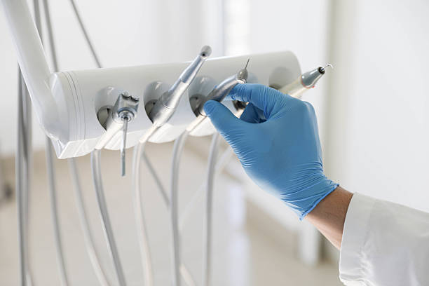 Professional Root Canal Treatment technician working in Abernathy, TX
